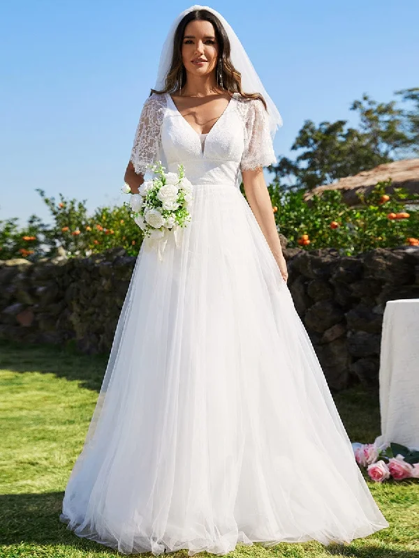 Plus Size Women Dress with a Flattering A - Line Cut for Comfort and StylePlus Size Women Dress with a Flattering A - Line Cut for Comfort and StyleV-Neck Tulle Wedding Dresses with Lace Short Sleeves